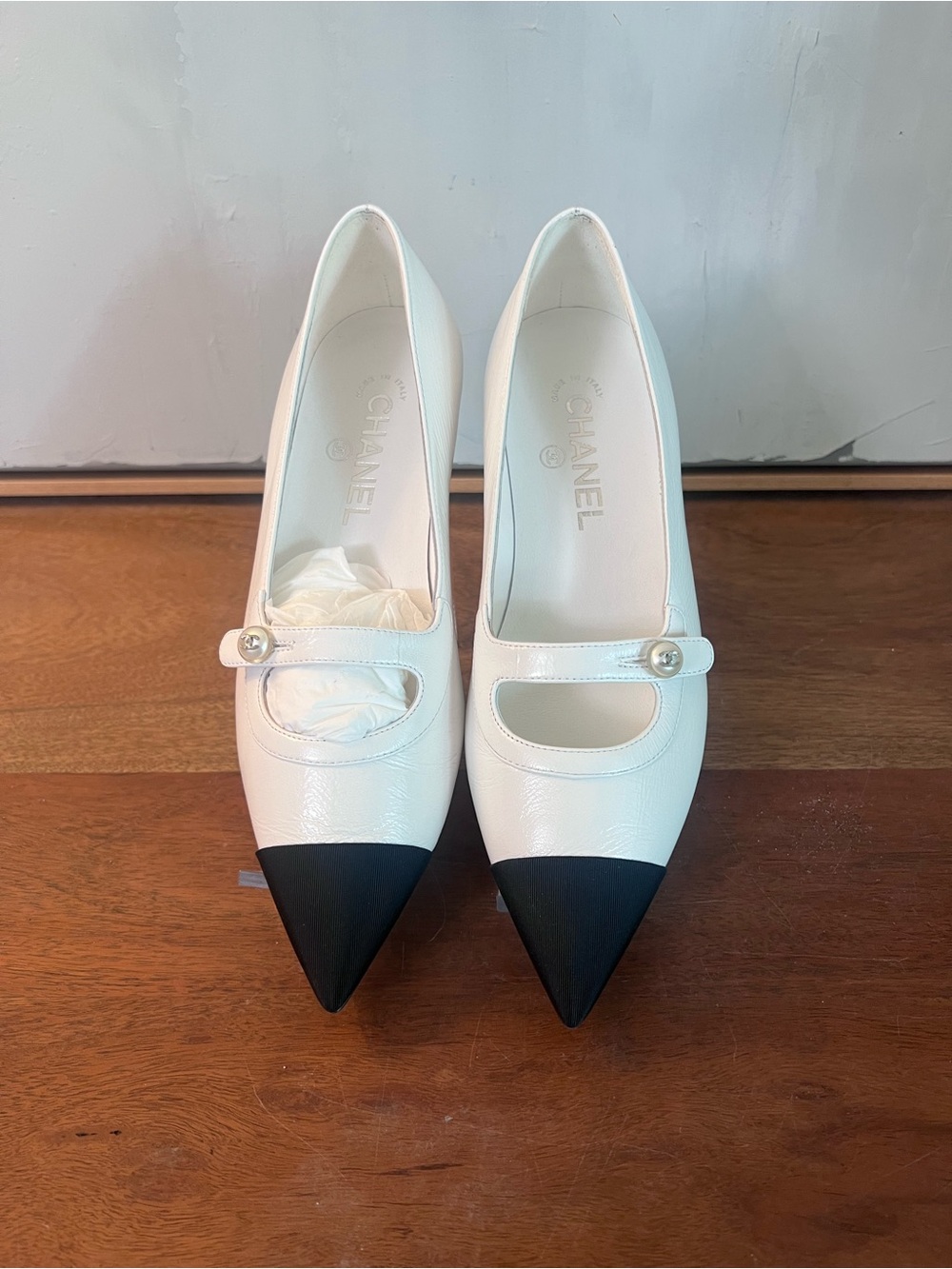 CHANEL White Leather Mary Jane Flats with Black Cap Toe